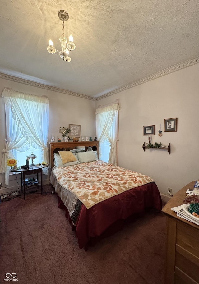 5395 W State Road 38, New Castle, IN 47362 - bedroom with an inviting chandelier, multiple windows, a textured ceiling, and carpet