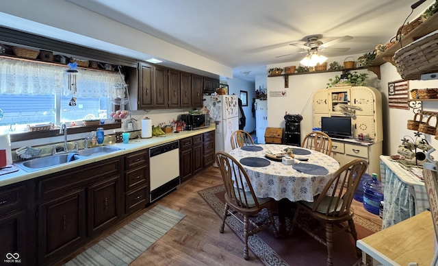 5395 W State Road 38, New Castle, IN 47362 - kitchen featuring ceiling fan, light countertops, wood finished floors, white appliances, and a sink