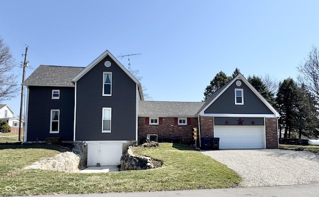 5395 W State Road 38, New Castle, IN 47362 - view of front of property featuring driveway, a front yard, a garage, and roof with shingles