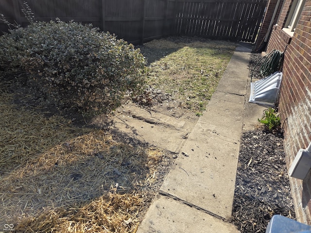 view of yard featuring a fenced backyard