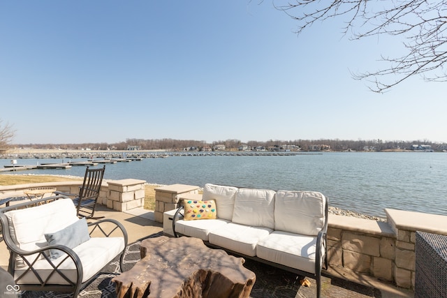 view of patio featuring a water view and an outdoor hangout area