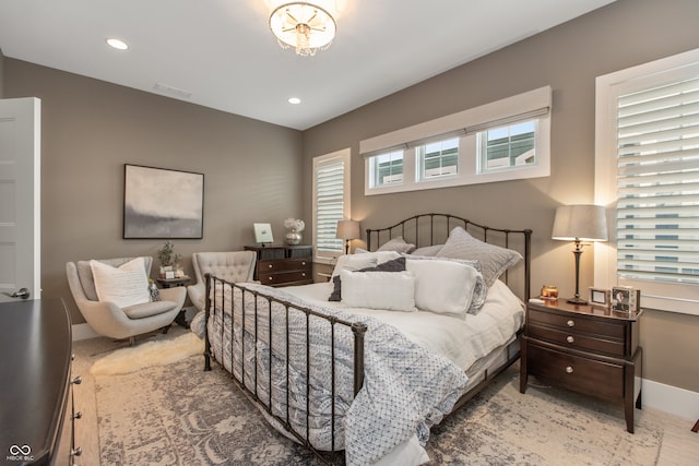 bedroom with recessed lighting, visible vents, and baseboards