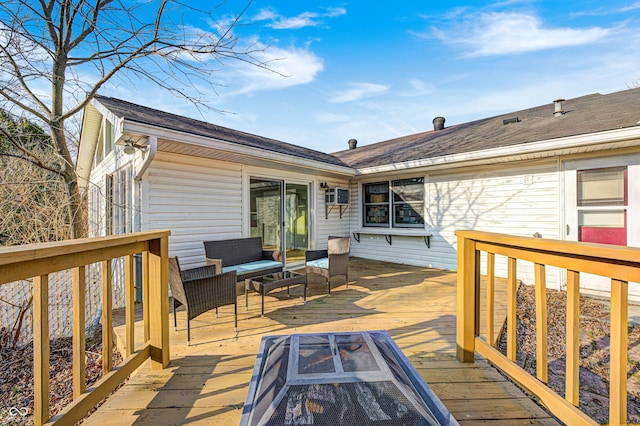 wooden deck with an outdoor hangout area