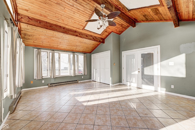 empty room with light tile patterned floors, wooden ceiling, and a baseboard heating unit