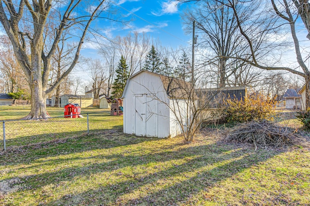 view of shed with fence