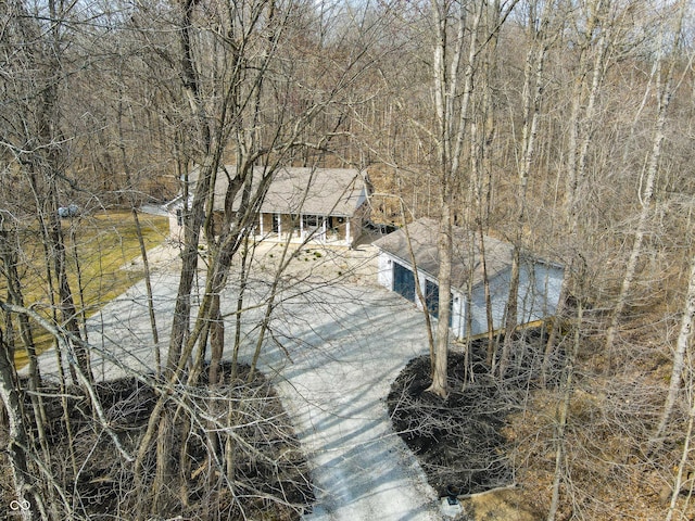 bird's eye view featuring a view of trees