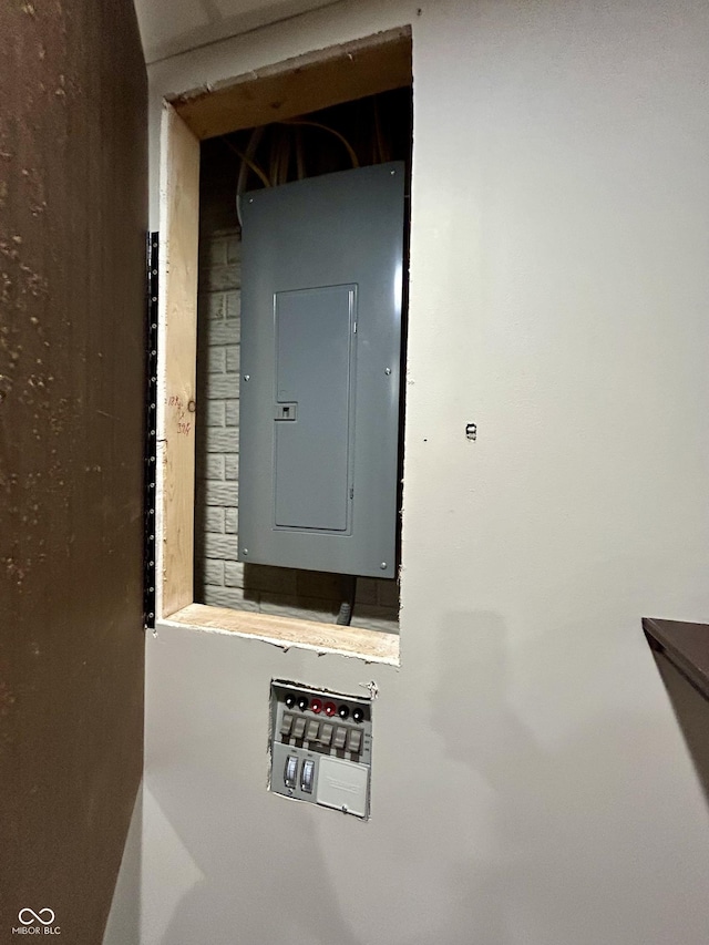 utility room with electric panel