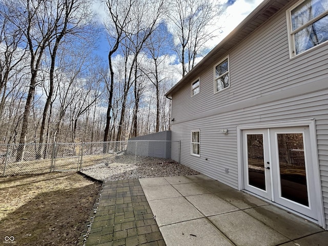 exterior space featuring french doors and a fenced backyard