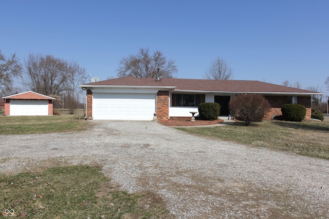 ranch-style house with brick siding and a front yard