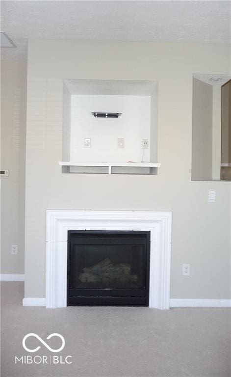 details with carpet flooring, baseboards, and a fireplace