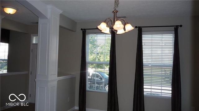 room details featuring an inviting chandelier