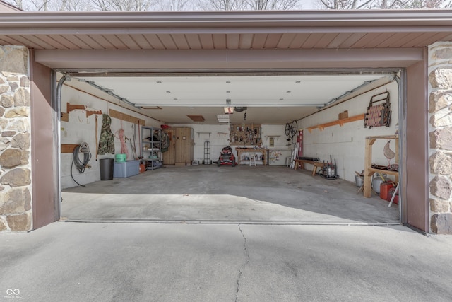 garage with a workshop area