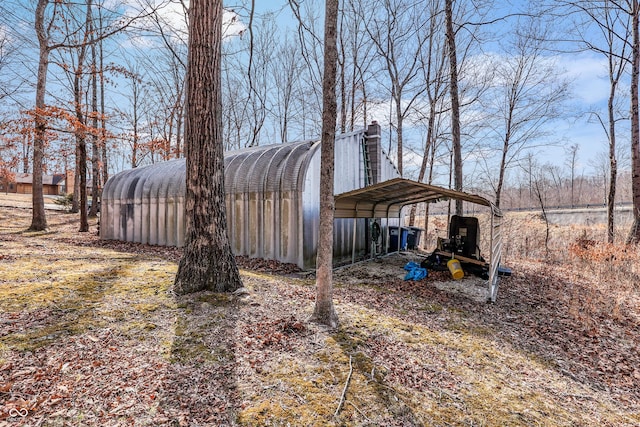 view of yard featuring a carport