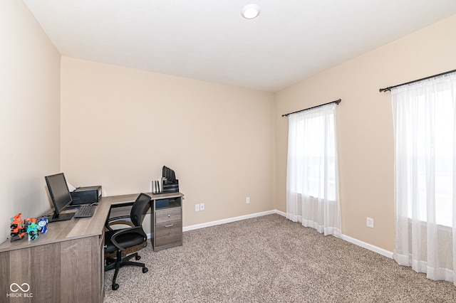 carpeted office with baseboards