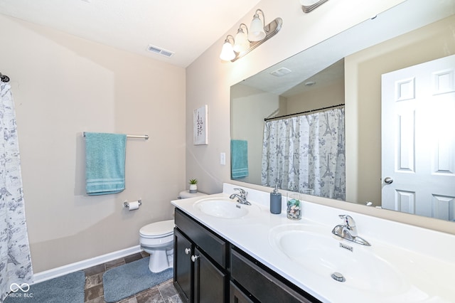 full bath with toilet, baseboards, visible vents, and a sink