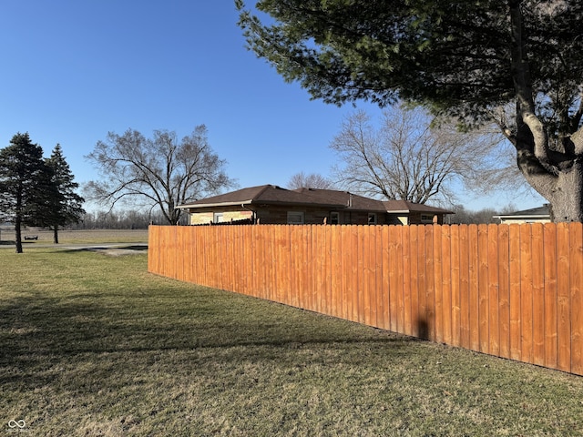 view of yard with fence