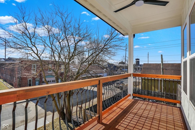 balcony with a sunroom and ceiling fan