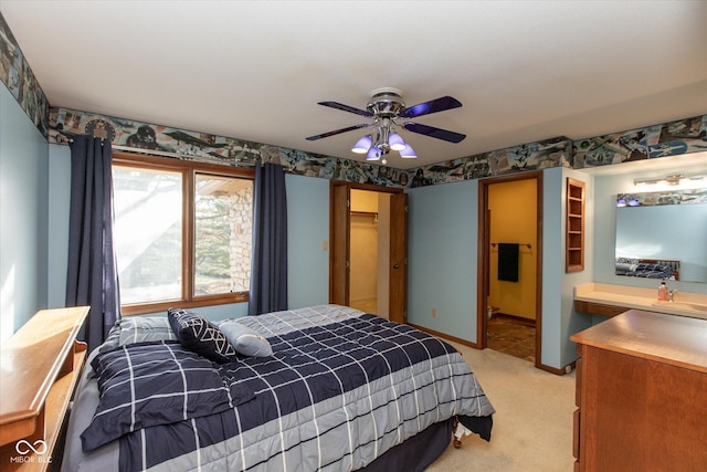 bedroom with baseboards, light carpet, and ceiling fan