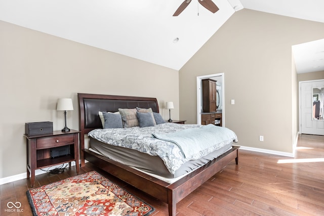 bedroom with ceiling fan, baseboards, high vaulted ceiling, and wood finished floors