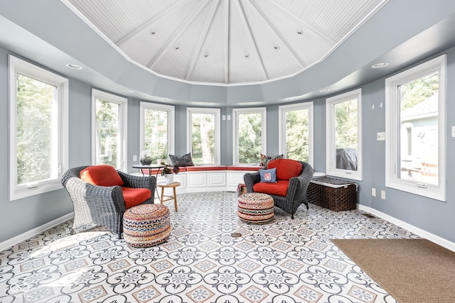 sunroom / solarium with lofted ceiling