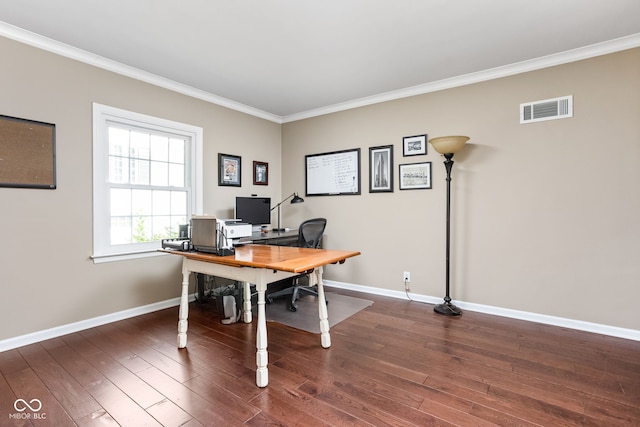 office with visible vents, ornamental molding, baseboards, and wood finished floors