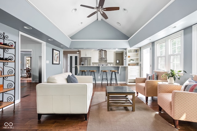 living room featuring ceiling fan, baseboards, dark wood-style flooring, and high vaulted ceiling