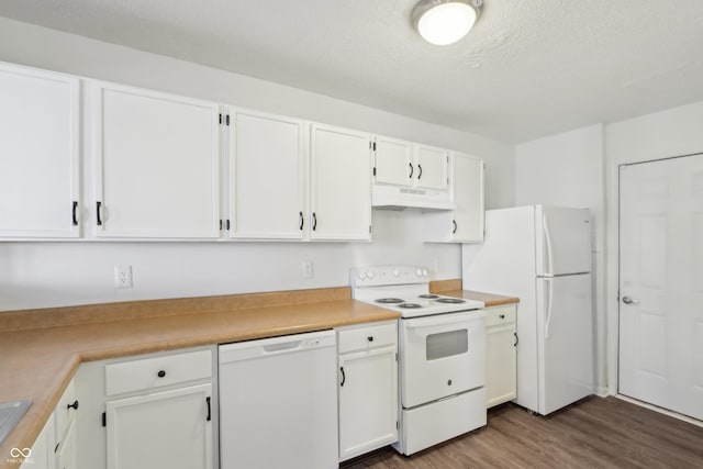 kitchen with under cabinet range hood, white cabinetry, white appliances, light countertops, and dark wood-style flooring