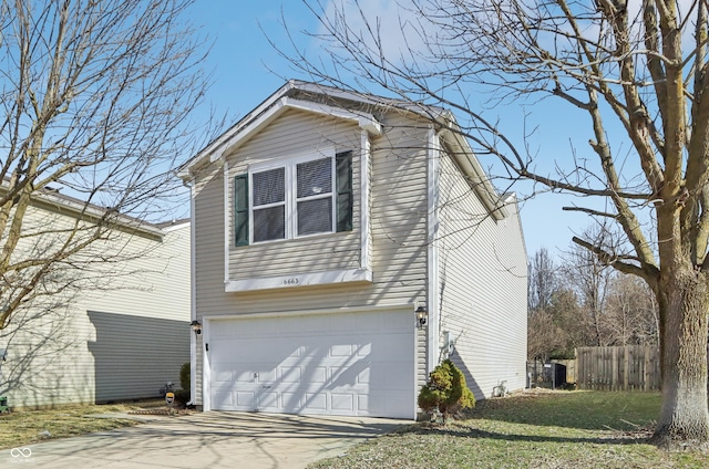 view of home's exterior with concrete driveway, an attached garage, and fence