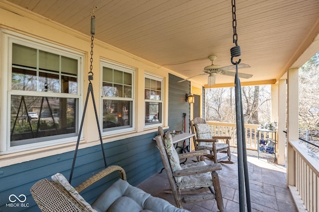 view of patio / terrace featuring a porch and a ceiling fan