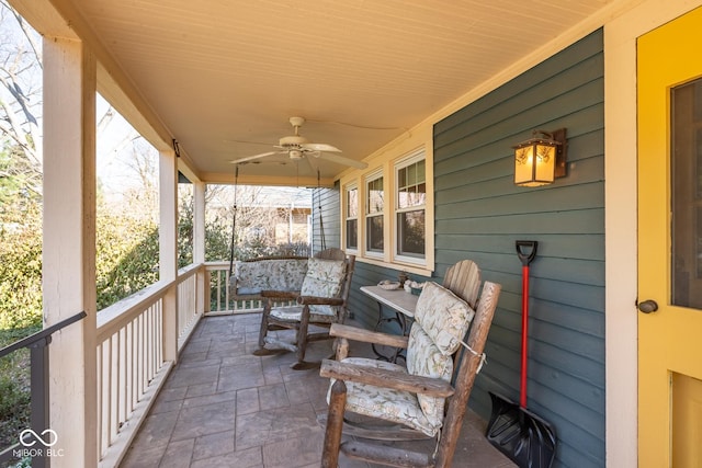 view of patio featuring a porch and a ceiling fan