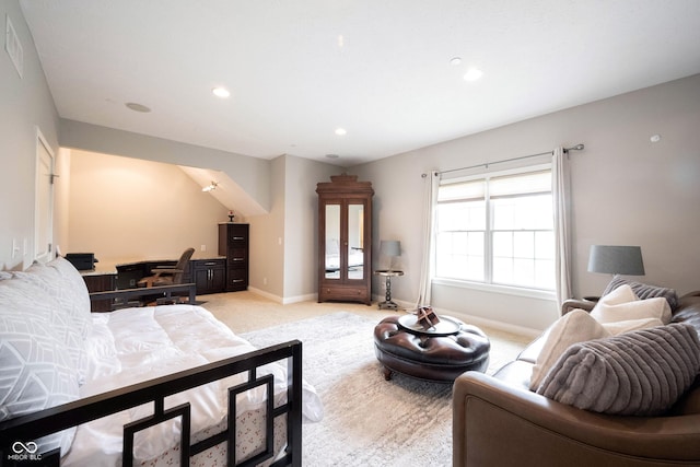 living room featuring recessed lighting, light colored carpet, and baseboards