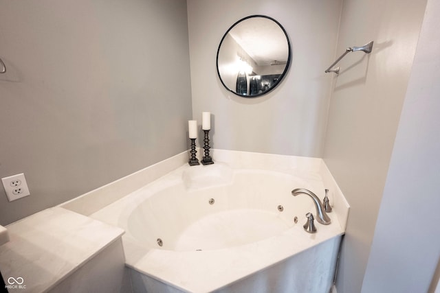 bathroom with a jetted tub