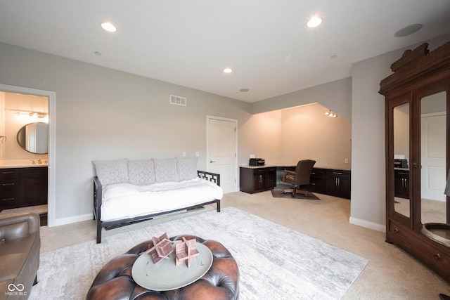 living area with light carpet, visible vents, recessed lighting, and baseboards