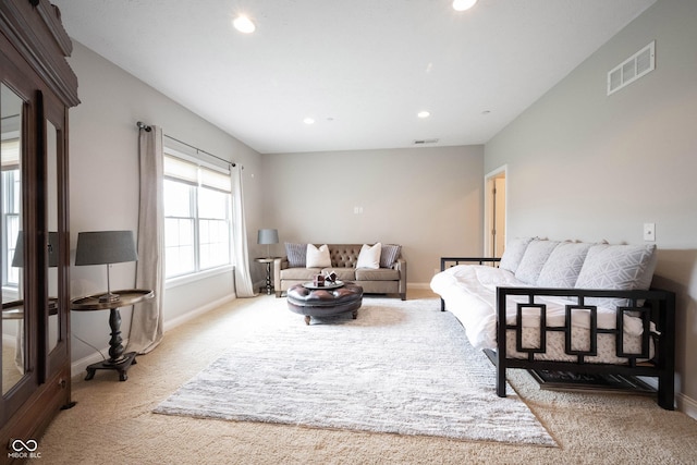 living room featuring recessed lighting, carpet, visible vents, and baseboards