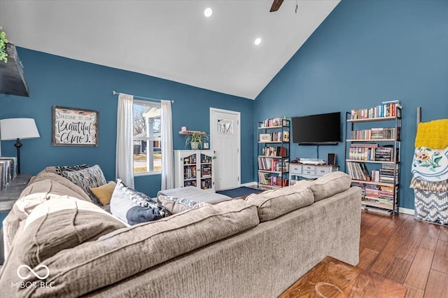 living area with a ceiling fan, wood finished floors, baseboards, high vaulted ceiling, and recessed lighting