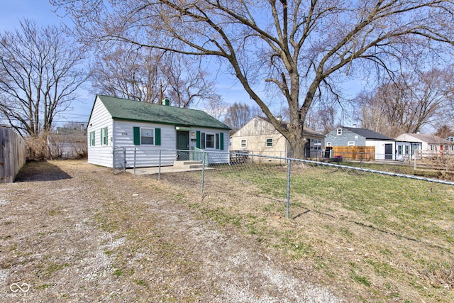 view of front of home featuring a fenced backyard