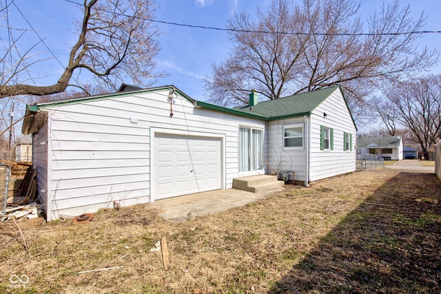 garage with driveway