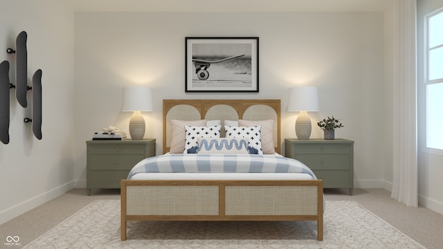 carpeted bedroom featuring baseboards