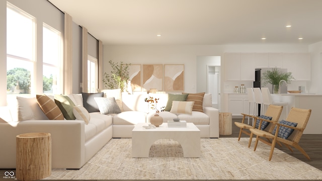 living area with recessed lighting and light wood-type flooring