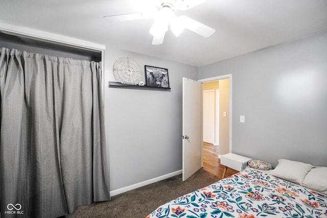 bedroom featuring a ceiling fan, carpet, and baseboards