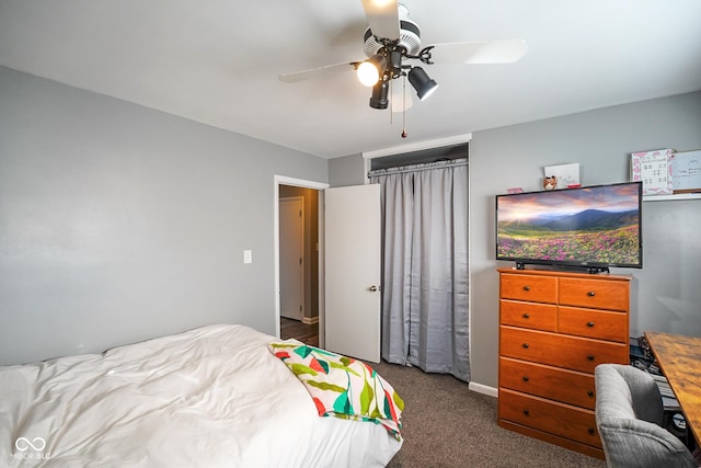 bedroom with a ceiling fan and carpet flooring