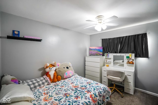 carpeted bedroom with baseboards and ceiling fan