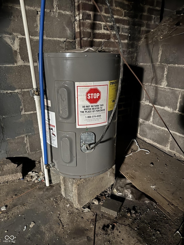 utility room with electric water heater