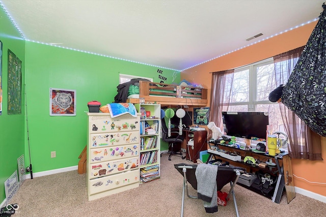 bedroom with visible vents, multiple windows, and baseboards