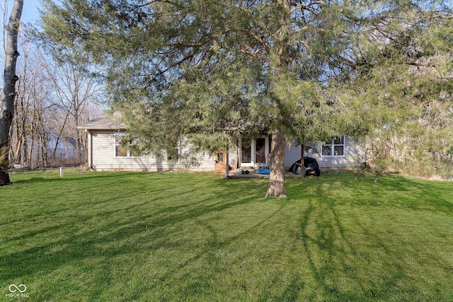 exterior space featuring a lawn