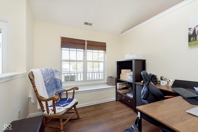 office space with visible vents, lofted ceiling, baseboards, and wood finished floors