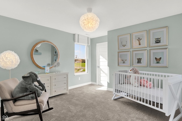 bedroom with baseboards and carpet floors