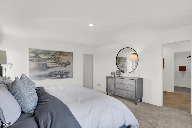 bedroom with carpet flooring, recessed lighting, and baseboards