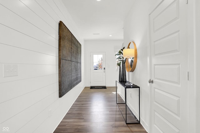 interior space featuring recessed lighting, baseboards, and dark wood-style flooring