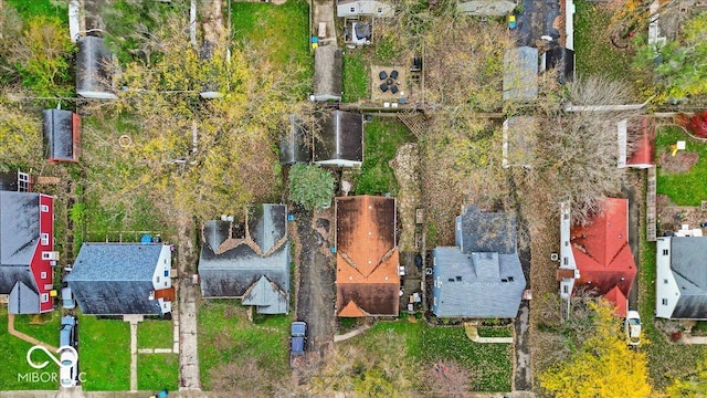 birds eye view of property with a residential view